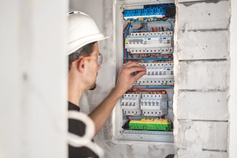 Man Electrical Technician Working Switchboard With Fuses Installation Connection Electrical Equipment 169016 5073